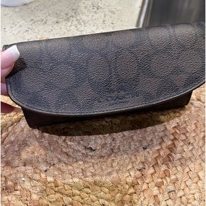 Coach black and brown wallet with animal print